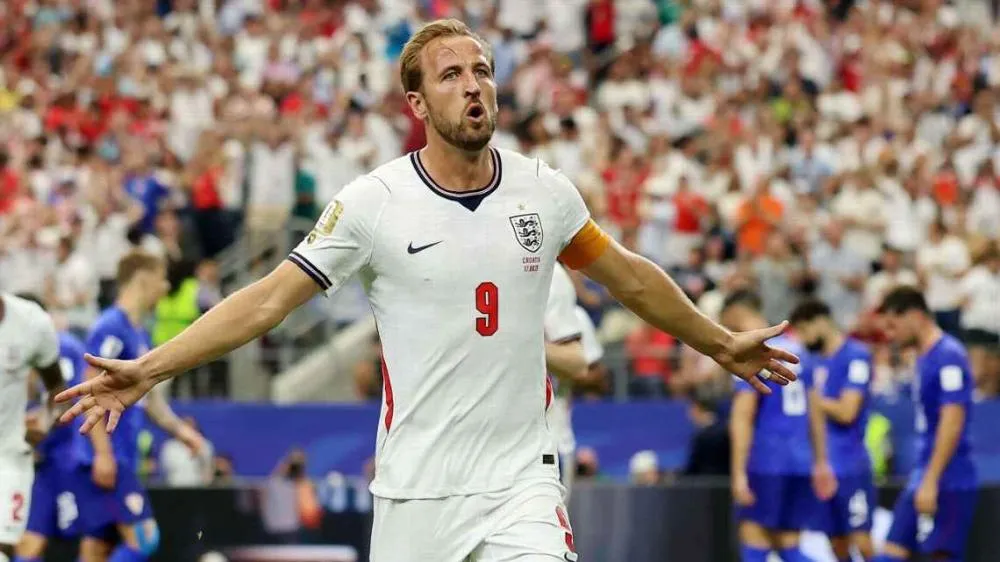 Harry Kane comemora de braços abertos seu gol contra a Croácia na Copa do Mundo de 2026 Maja Hitij - FIFA/FIFA via Getty Images